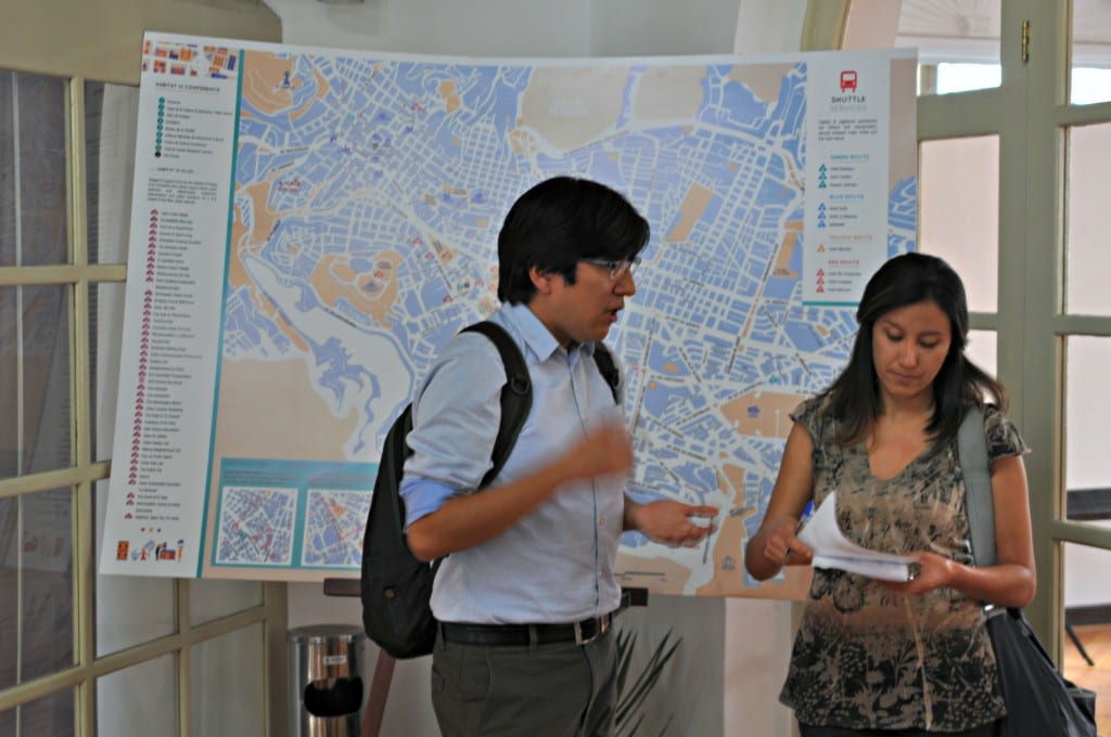 Data Driven researcher, Diego Manya, addresses a question from a participant at the UN-Habitat 3 Village.